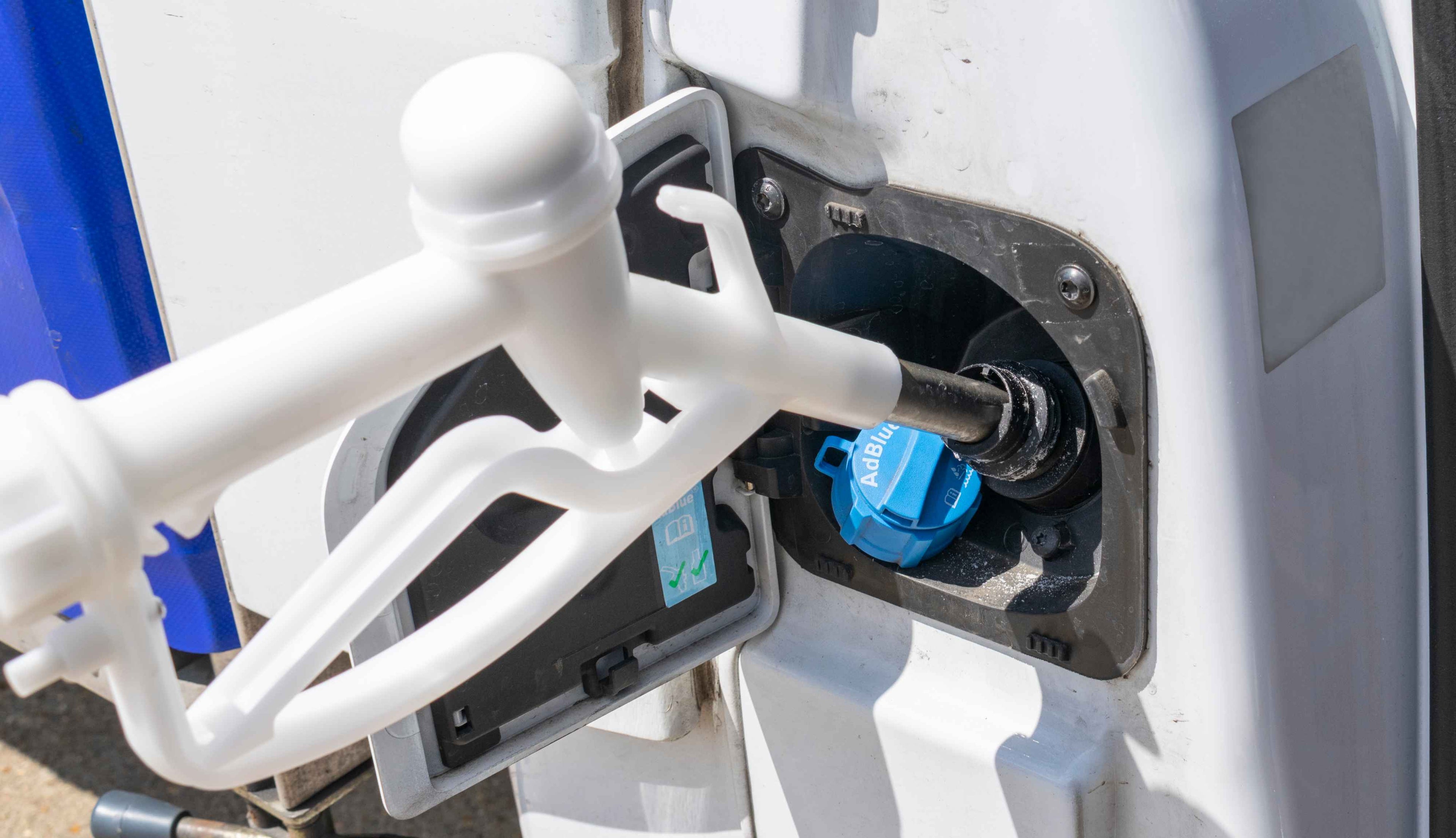 White Ad-Blue & Fuel Dispensing Nozzle for 1" Hose with Metal Tip